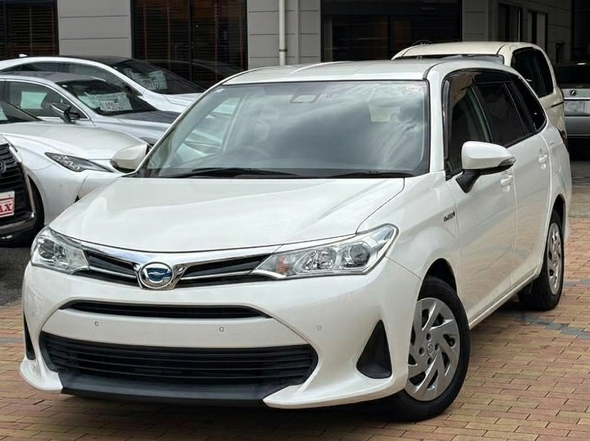 2019 Toyota  Corolla Fielder Hybrid – 1.5L Toyota Synergy Drive | Grade 4 Premium Condition | Only 37k km | Full Safety Sense & Back Camera | Pristine Pearl White Fuel-Saving Wagon